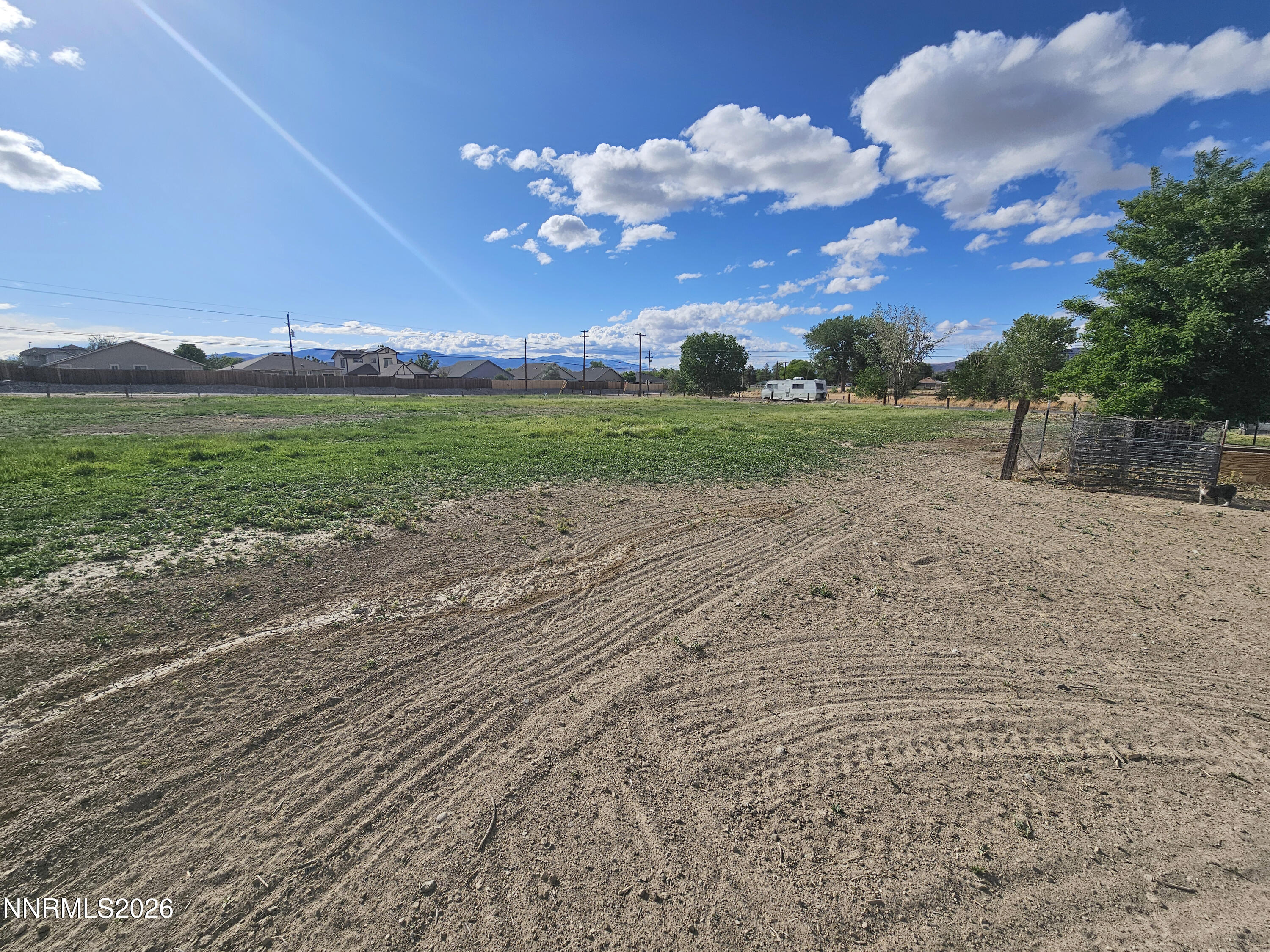 1125 Rancho Road Fernley, NV 89408 - Photo 43 of 47 a view of a house with a big yard