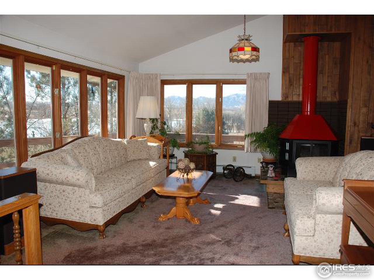 9251 Valmont Road Boulder, CO 80301 - Photo 4 of 14 a living room with furniture and a large window