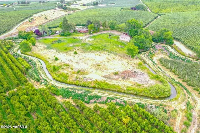 a view of a lake with a big yard