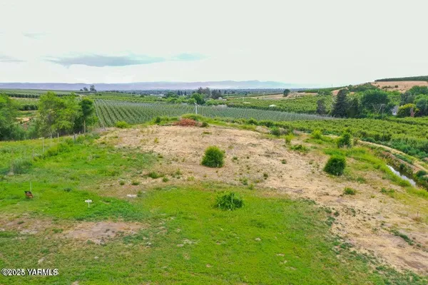 a view of a lake with a big yard