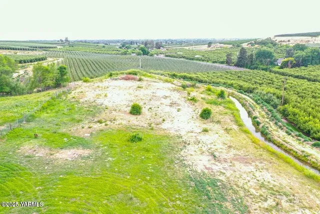 a view of a lake with a big yard