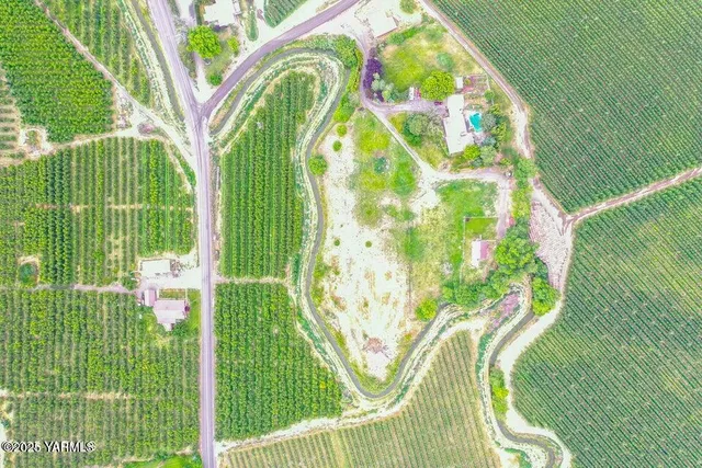 a view of swimming pool from a balcony