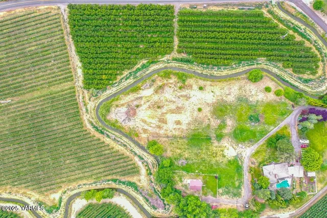 a view of swimming pool from a lake view