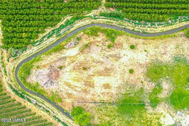 a view of swimming pool from a lake view