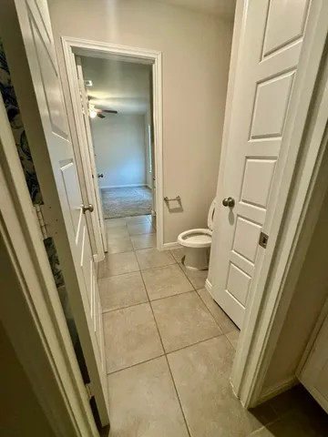 a bathroom with a tub and shower