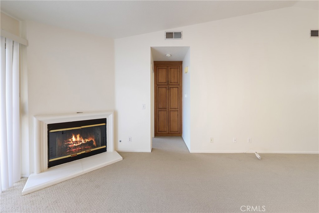 14 Abrigo Rancho Santa Margarita, CA 92688 - Photo 11 of 40 a view of an empty room with fire place