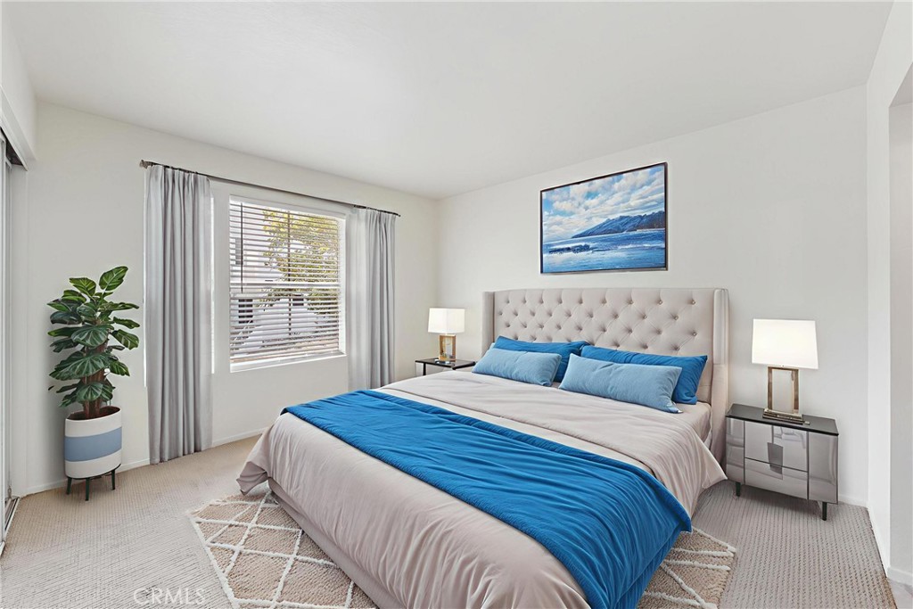 14 Abrigo Rancho Santa Margarita, CA 92688 - Photo 20 of 40 a bedroom with a bed and a window
