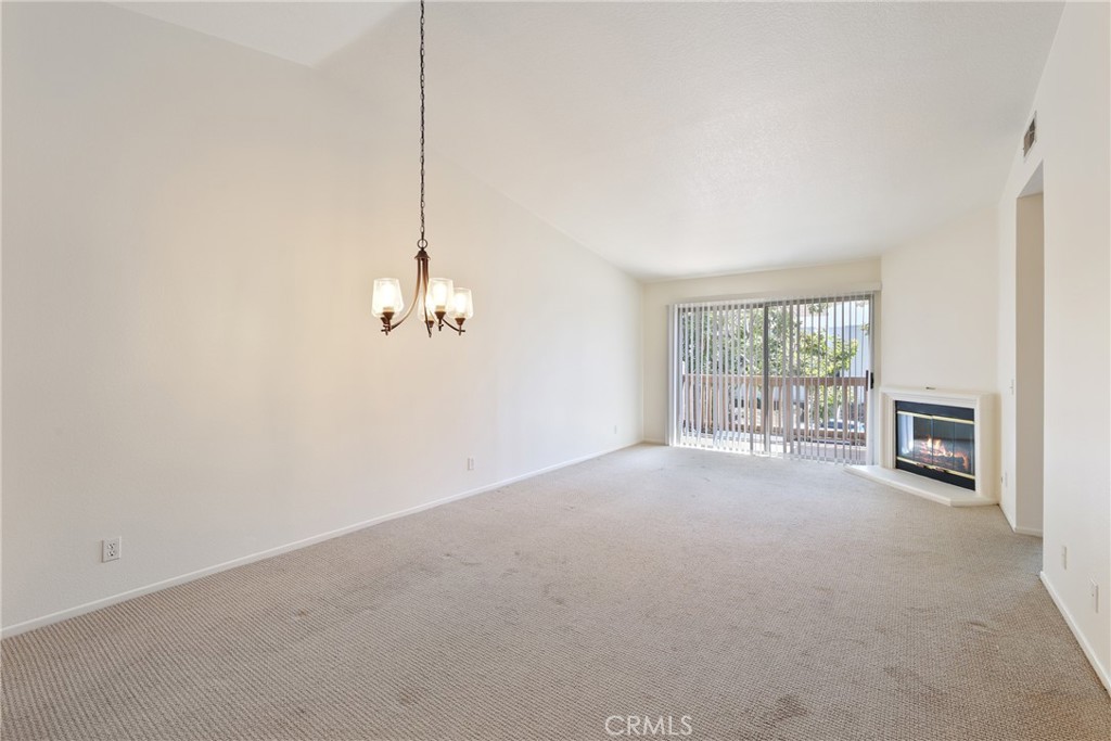 14 Abrigo Rancho Santa Margarita, CA 92688 - Photo 7 of 40 a view of a livingroom with a ceiling fan and window
