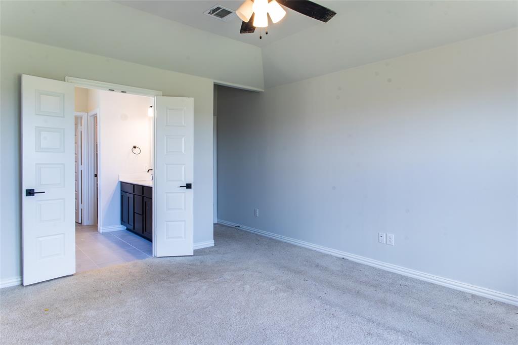 2604 Freeman Street Anna, TX 75409 - Photo 5 of 18 an empty room with a bathroom