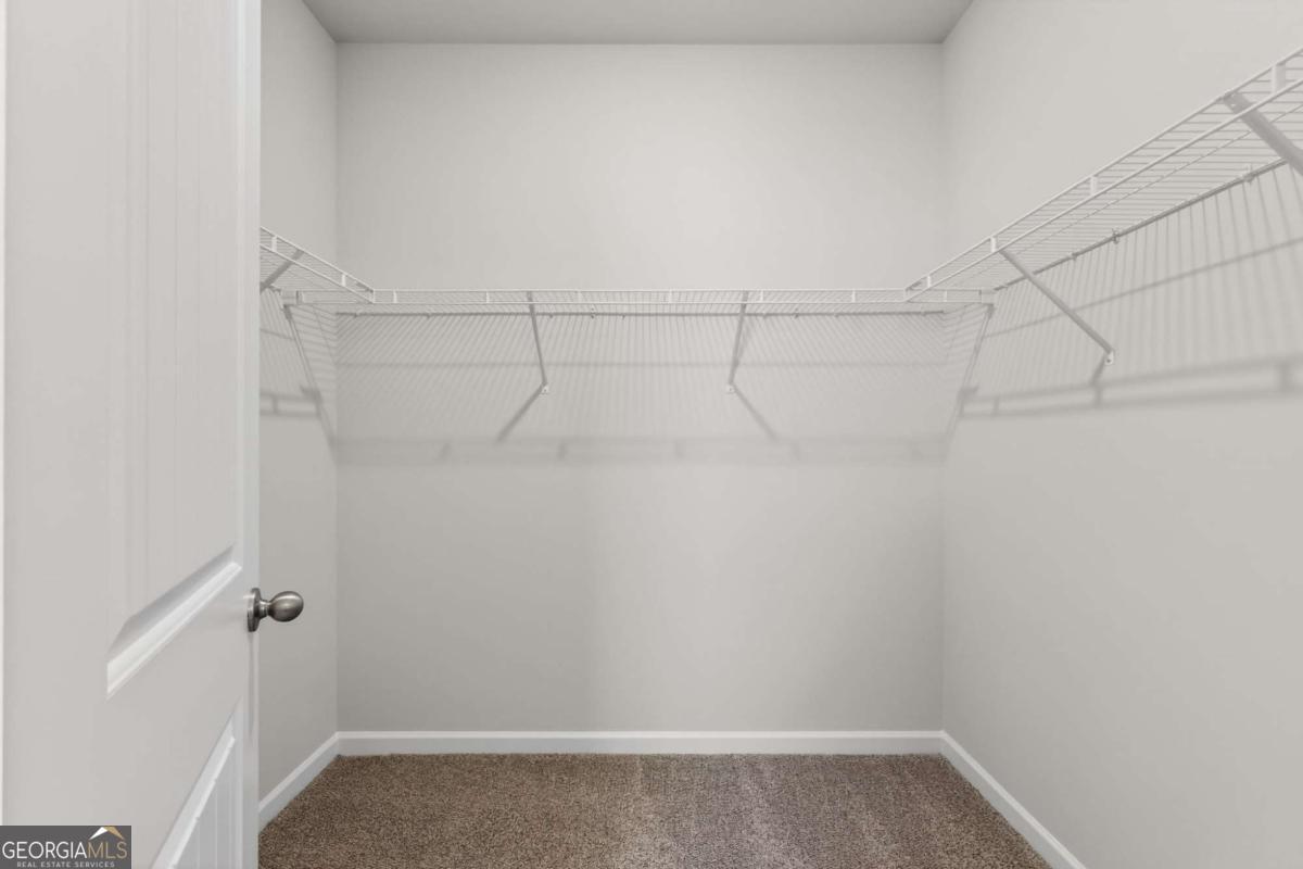 205 Riverview Road Franklin, GA 30217 - Photo 17 of 26 a view of a room with racks on the wall