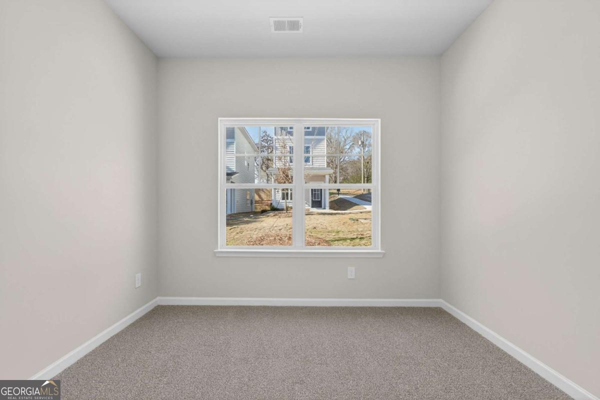 205 Riverview Road Franklin, GA 30217 - Photo 19 of 26 an empty room with a window
