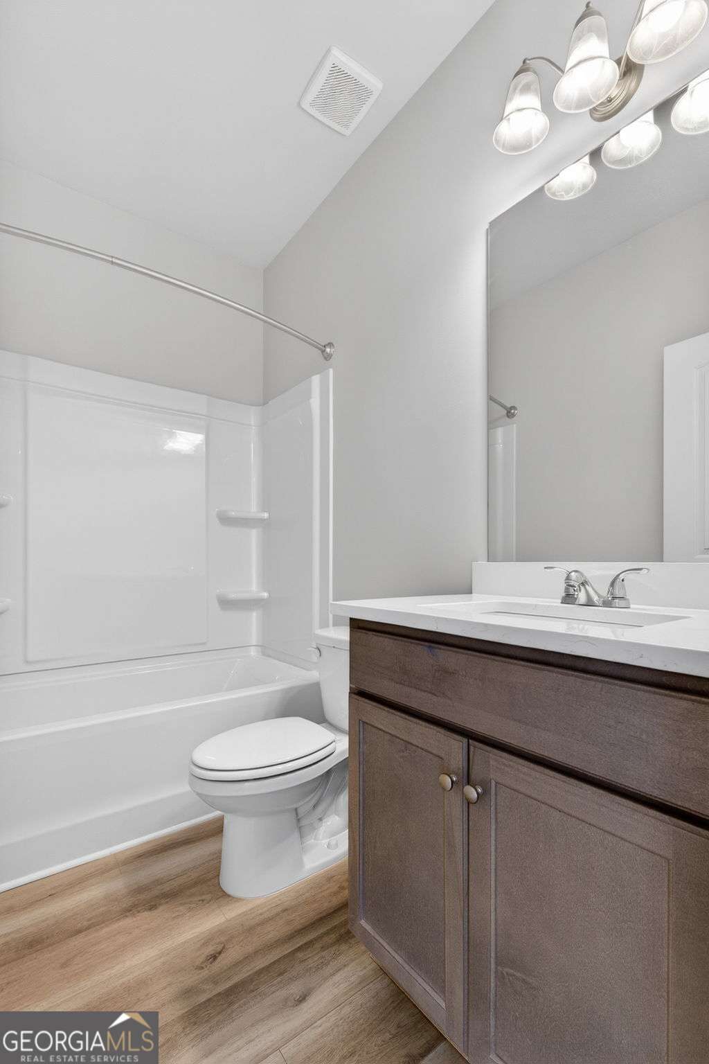 205 Riverview Road Franklin, GA 30217 - Photo 21 of 26 a bathroom with a sink a toilet and a mirror