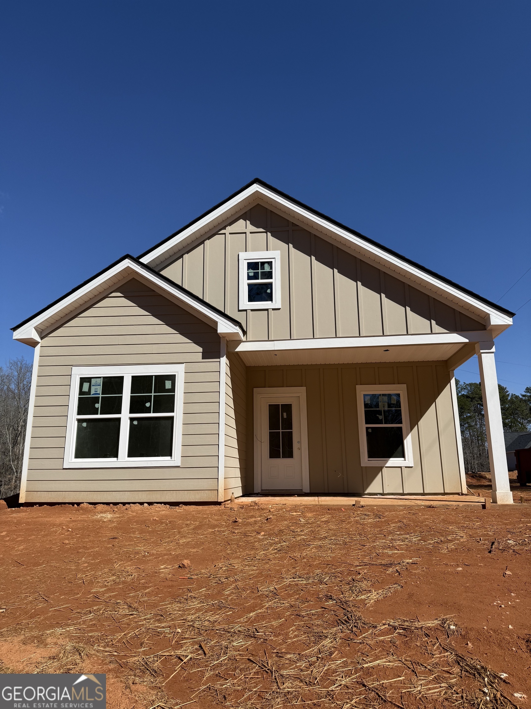 205 Riverview Road Franklin, GA 30217 - Photo 3 of 26 a front view of a house with garage