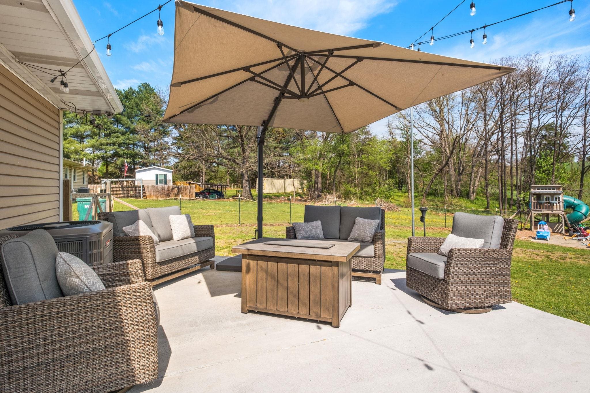 8208 George Wine Road Bridgewater, VA 22812 - Photo 26 of 27 a outdoor living space with patio furniture and a umbrella