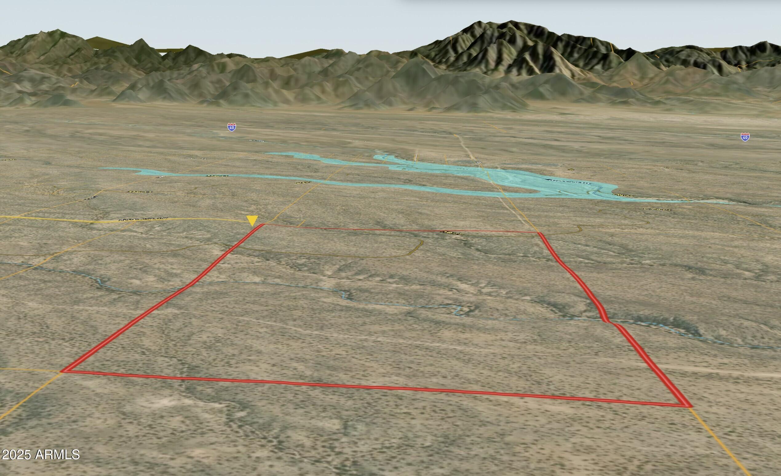 5000 Sheldon Drive, Unit ''' Golden Valley, AZ 86413 - Photo 2 of 15 a view of a lake with a mountain