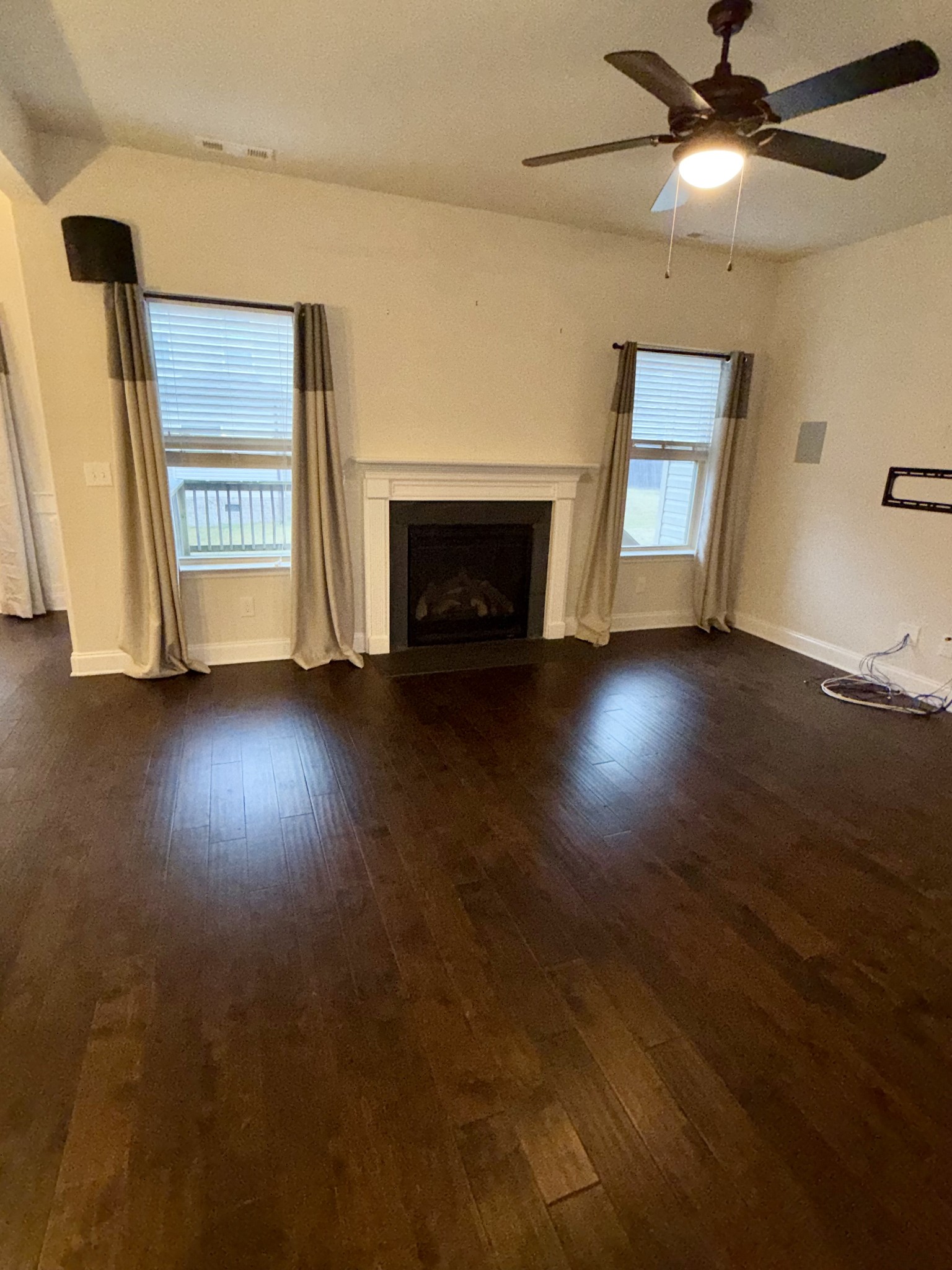 4012 Lexie Lane Spring Hill, TN 37174 - Photo 11 of 38 a view of an empty room with window and fireplace
