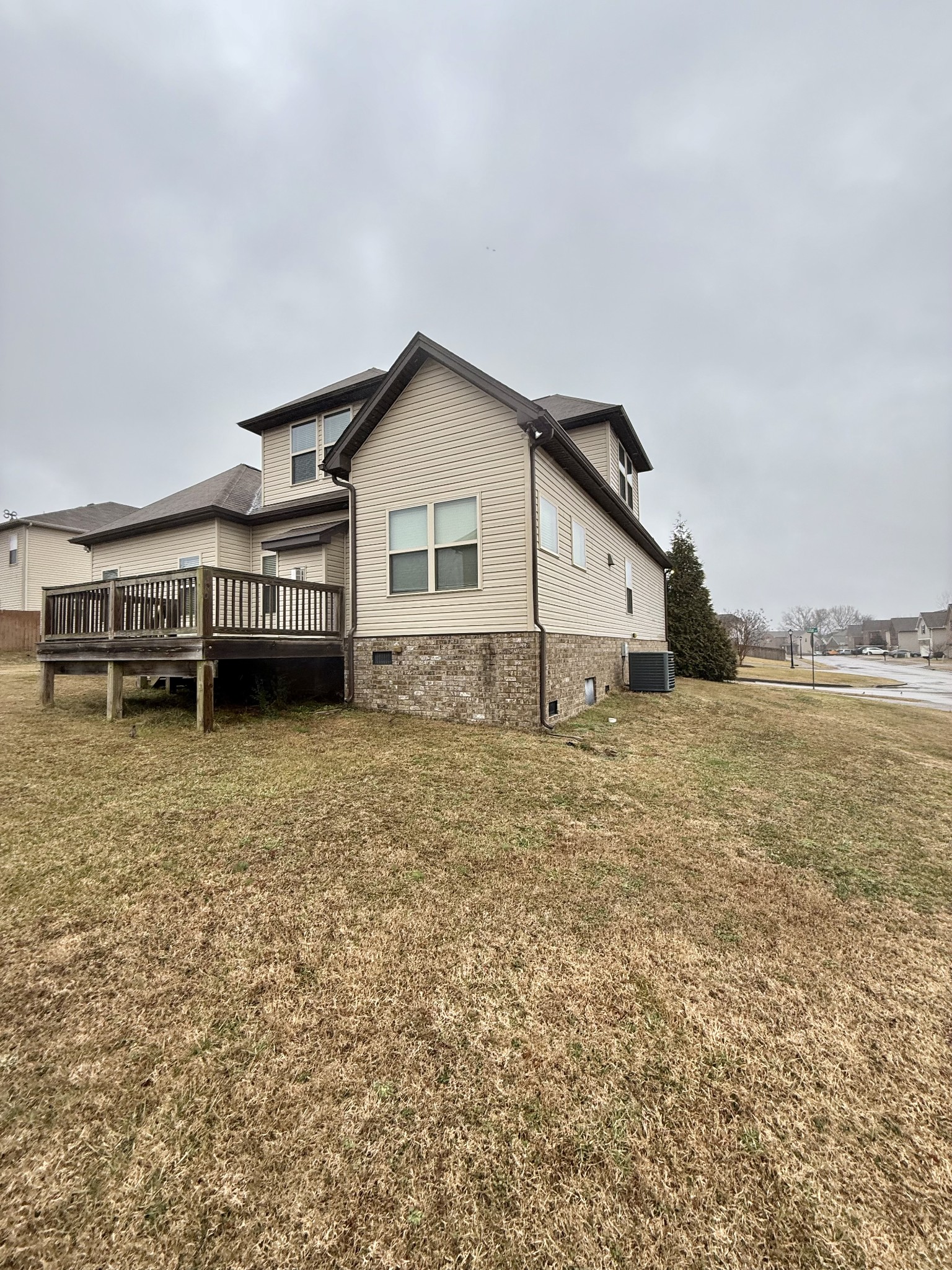 4012 Lexie Lane Spring Hill, TN 37174 - Photo 18 of 38 a view of a house with a yard and sitting area