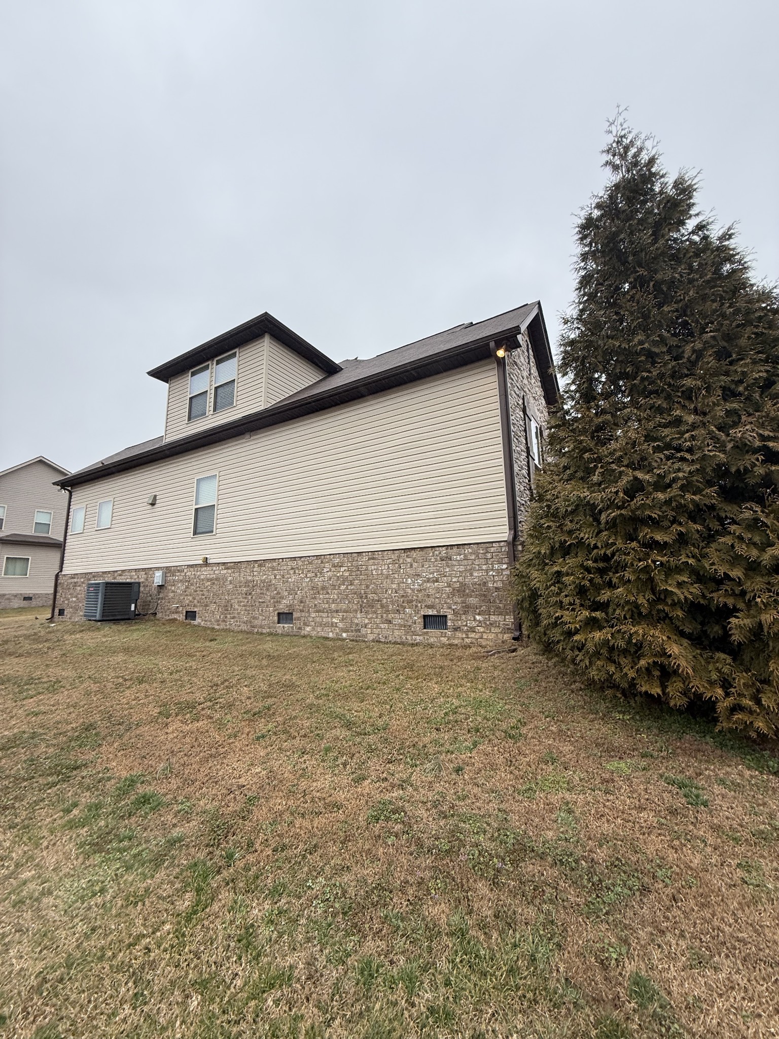 4012 Lexie Lane Spring Hill, TN 37174 - Photo 20 of 38 a house with trees in front of it