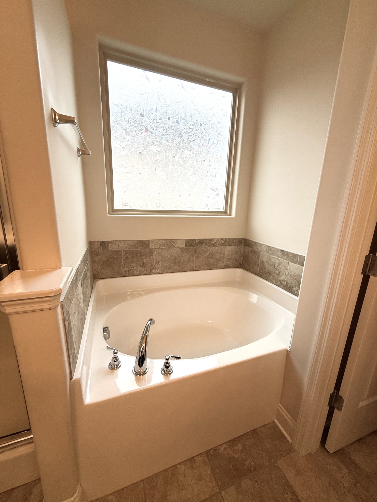 4012 Lexie Lane Spring Hill, TN 37174 - Photo 24 of 38 a bath tub sitting in a bathroom next to a window