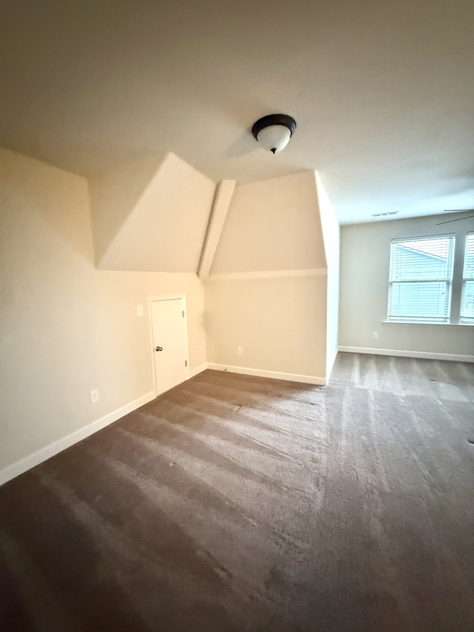 4012 Lexie Lane Spring Hill, TN 37174 - Photo 26 of 38 an empty room with wooden floor and windows