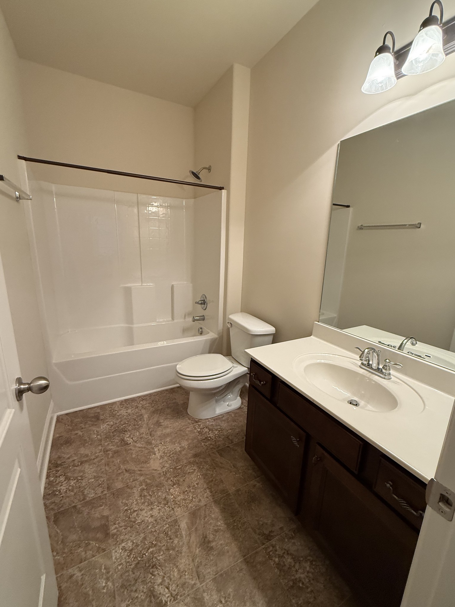 4012 Lexie Lane Spring Hill, TN 37174 - Photo 32 of 38 a bathroom with a sink toilet and shower