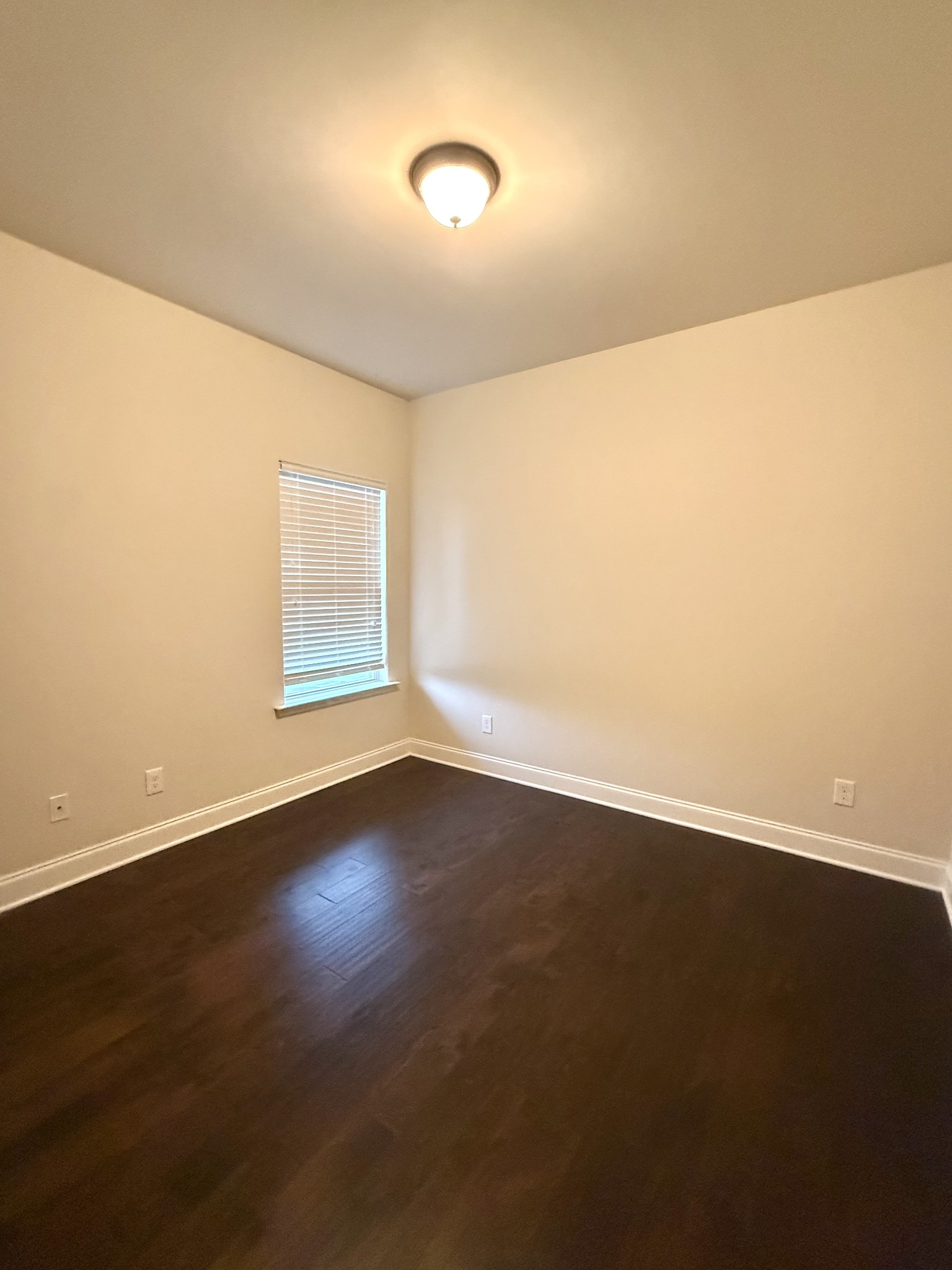 4012 Lexie Lane Spring Hill, TN 37174 - Photo 36 of 38 an empty room with wooden floor and windows
