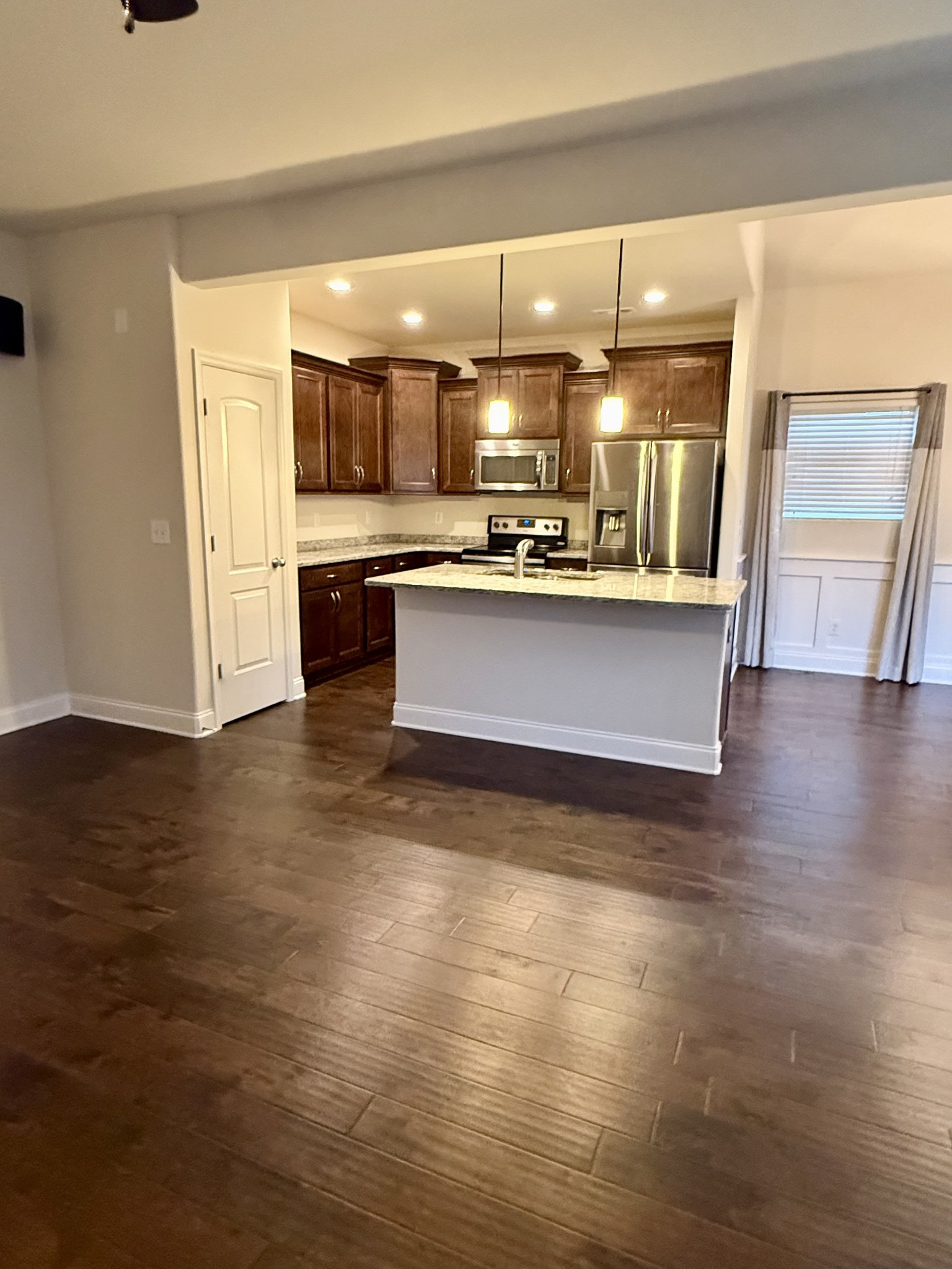 4012 Lexie Lane Spring Hill, TN 37174 - Photo 9 of 38 a view of kitchen with cabinets and wooden floor