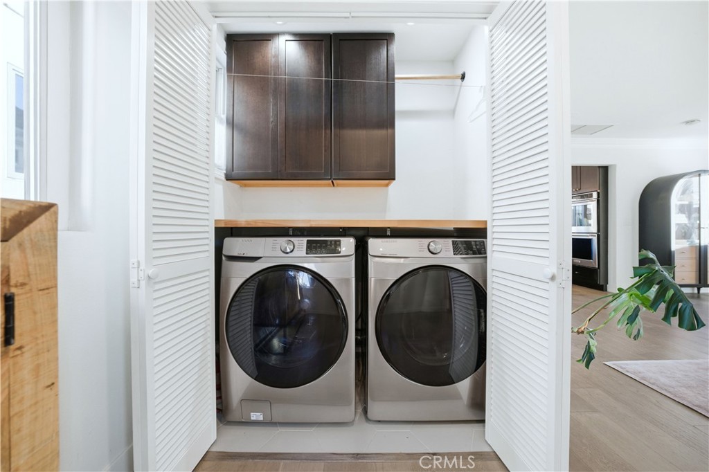 32 56th Place Long Beach, CA 90803 - Photo 16 of 49 a utility room with dryer and washer