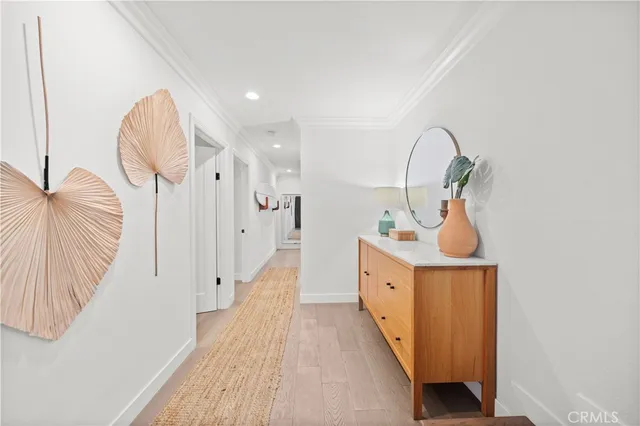 a spacious bathroom with a sink and mirror
