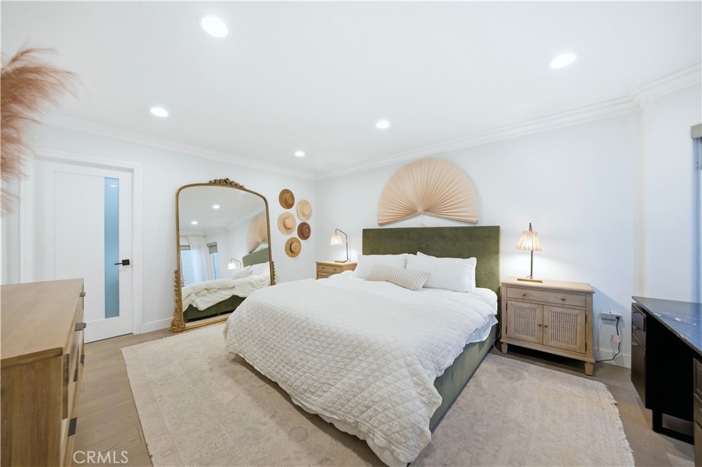 32 56th Place Long Beach, CA 90803 - Photo 25 of 49 a bedroom with a bed and a mirror