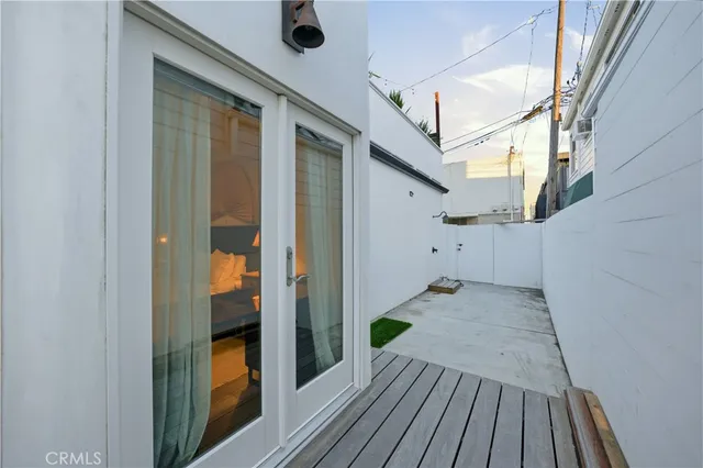 a view of balcony and wooden floor