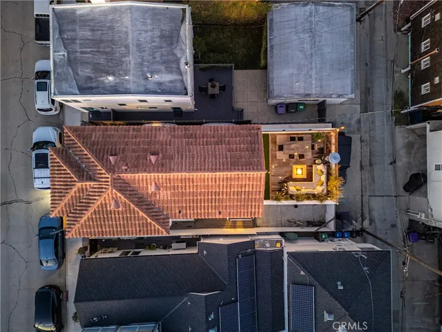 a front view of multi story residential apartment building with yard