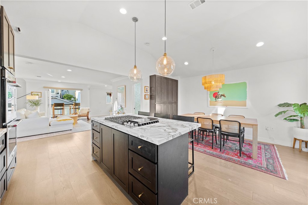 32 56th Place Long Beach, CA 90803 - Photo 8 of 49 a open kitchen with stainless steel appliances granite countertop a stove and a view of living room