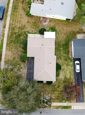 an aerial view of residential house with outdoor space