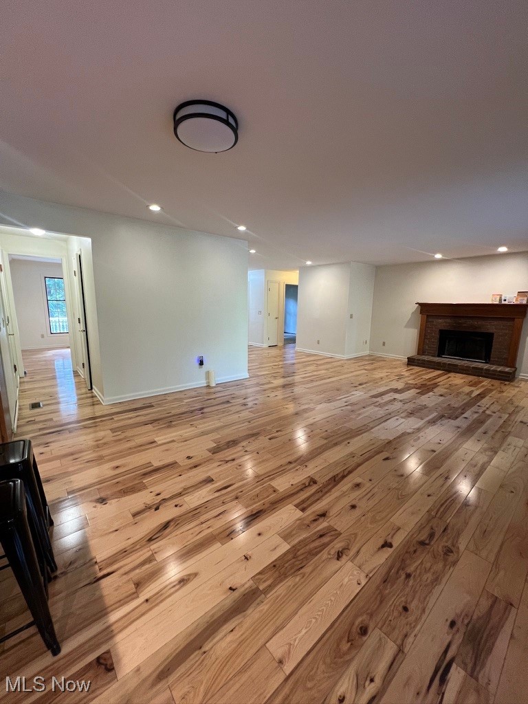 11331 Palmer Road Painesville, OH 44077 - Photo 12 of 47 Unfurnished living room with light wood-type flooring