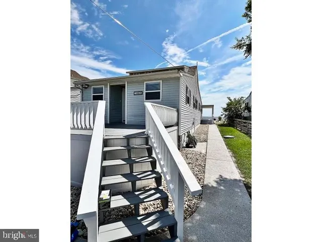 a view of a living room with a bench