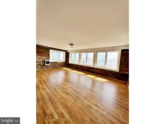 a bathroom with a sink a toilet and vanity