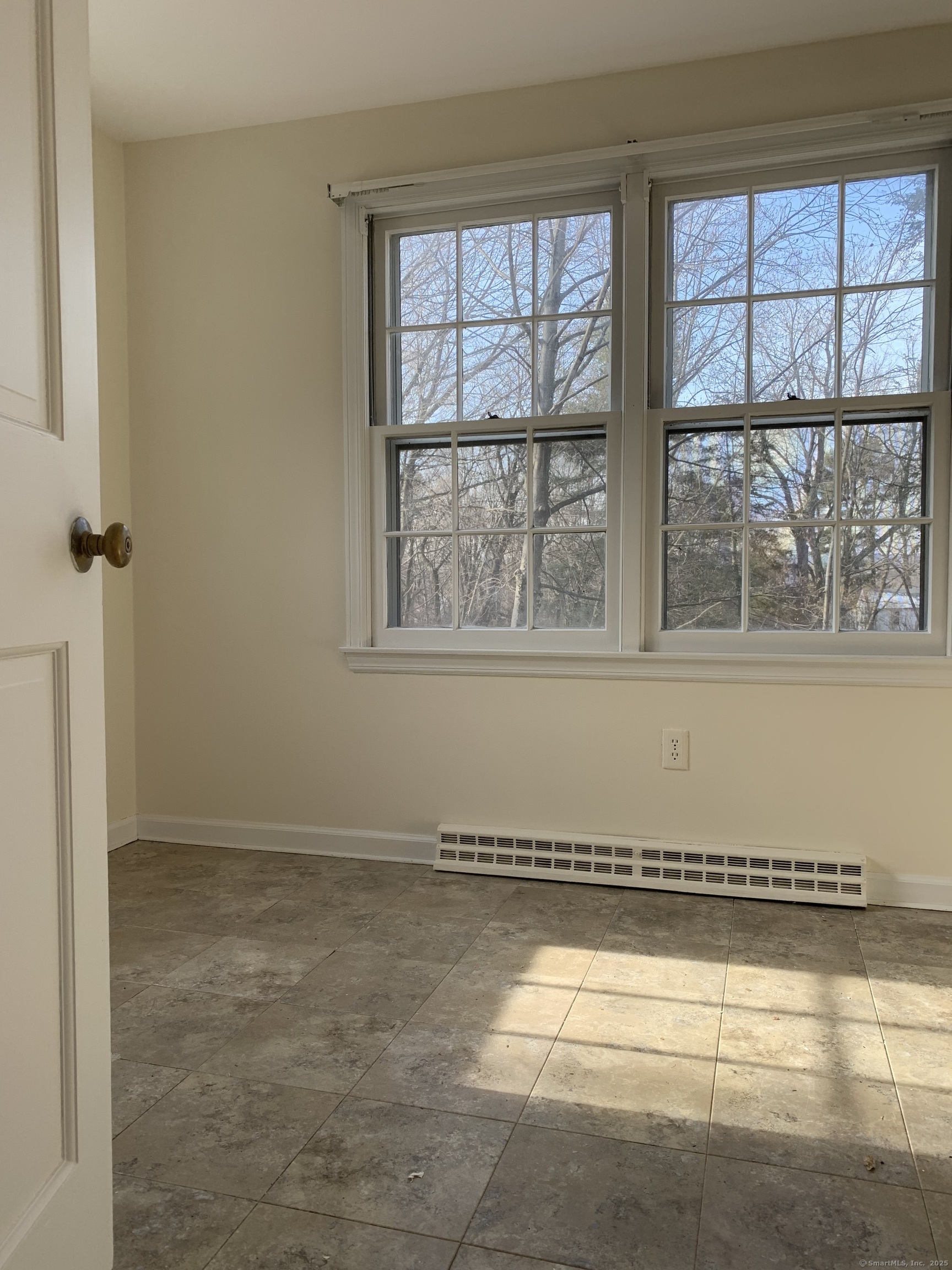 16 Garfield Avenue North Haven, CT 06473 - Photo 11 of 26 an empty room with a empty space and windows