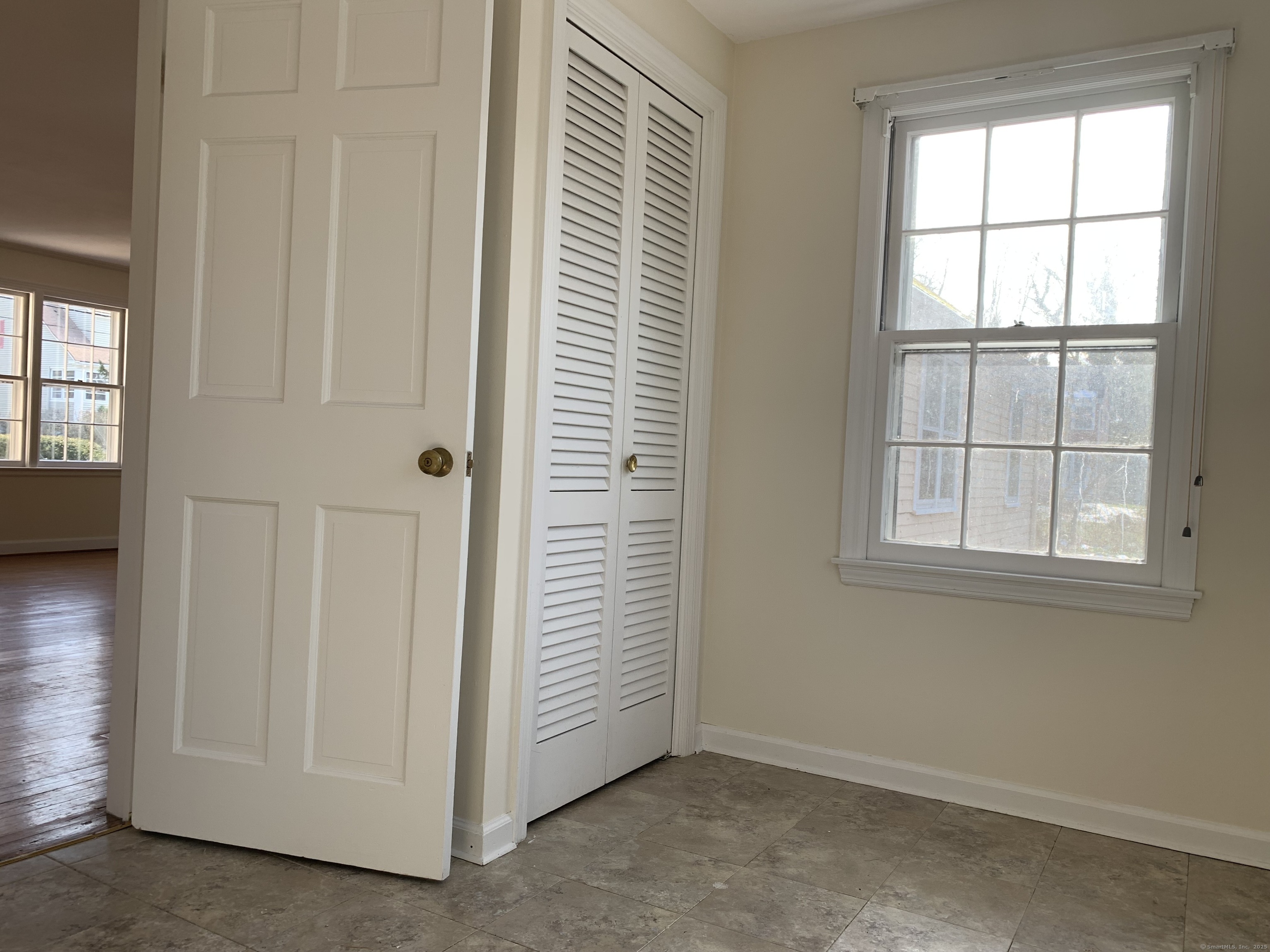 16 Garfield Avenue North Haven, CT 06473 - Photo 12 of 26 an empty room with windows