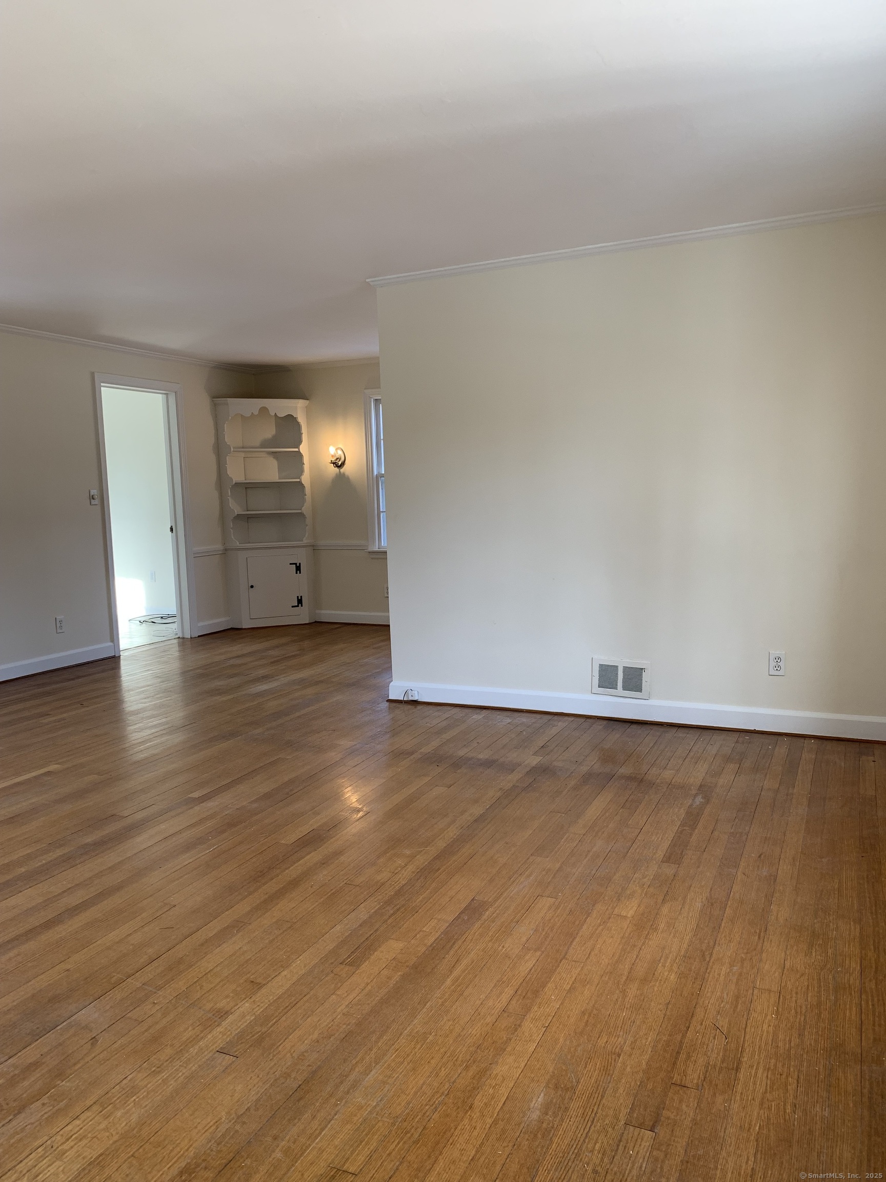 16 Garfield Avenue North Haven, CT 06473 - Photo 15 of 26 an empty room with wooden floor and windows