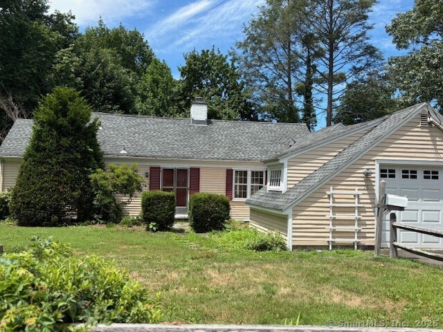 16 Garfield Avenue North Haven, CT 06473 - Photo 2 of 26 a view of a house with backyard