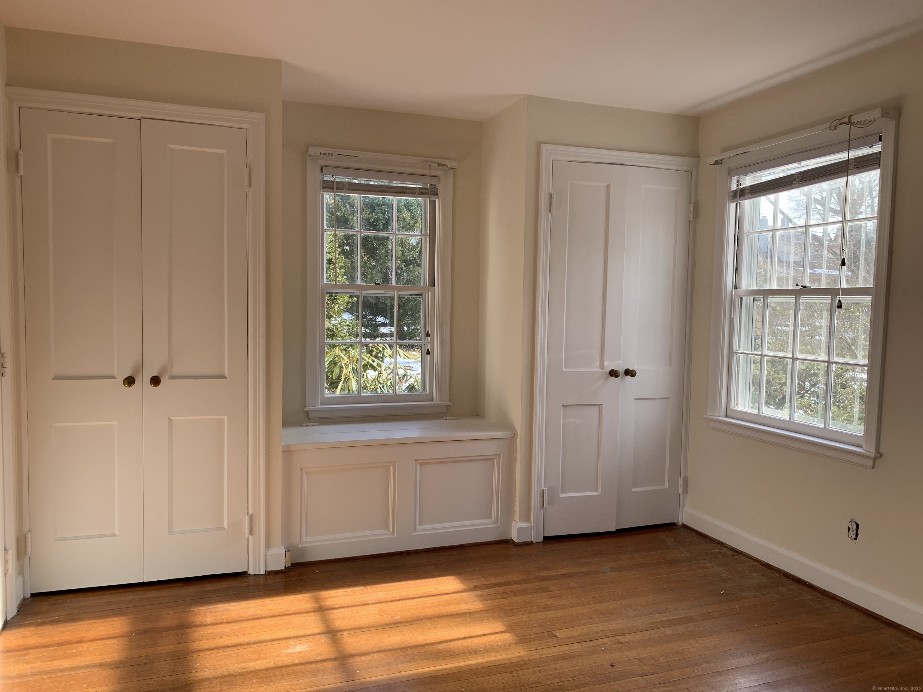 16 Garfield Avenue North Haven, CT 06473 - Photo 21 of 26 an empty room with wooden floor and windows