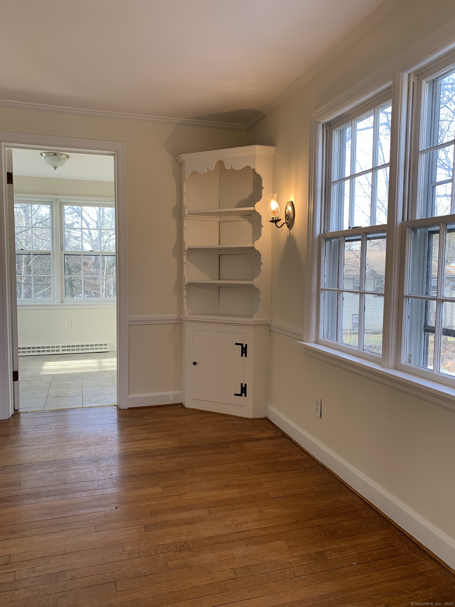 16 Garfield Avenue North Haven, CT 06473 - Photo 7 of 26 wooden floor in an empty room with a window