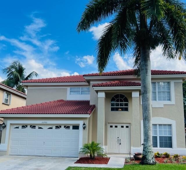 10760 Lake Oak Way Boca Raton, FL 33498 - Photo 1 of 26 Front view