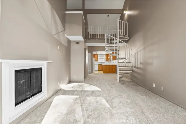 a view of a livingroom with a fireplace