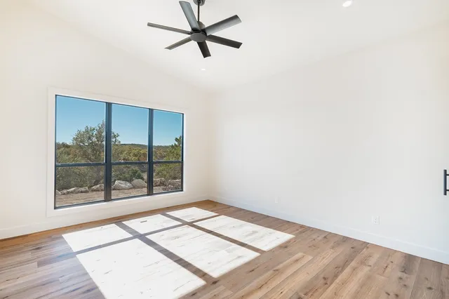 a spacious bathroom with a double vanity sink double and mirror