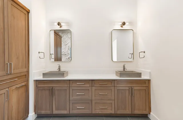 a bathroom with a toilet a sink and bathtub