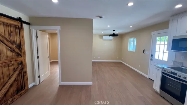 an empty room with a bathroom