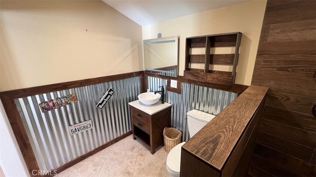 10908 Canby Avenue Porter Ranch, CA 91326 - Photo 25 of 26 a view of a balcony with furniture