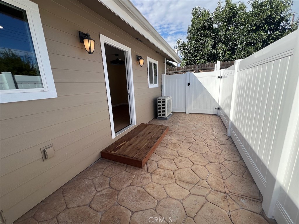 10908 Canby Avenue Porter Ranch, CA 91326 - Photo 3 of 26 a view of a house with a backyard